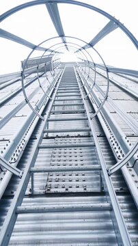 Steel hude agricultural storage for farming. Big storage elevator construction. Vertical video