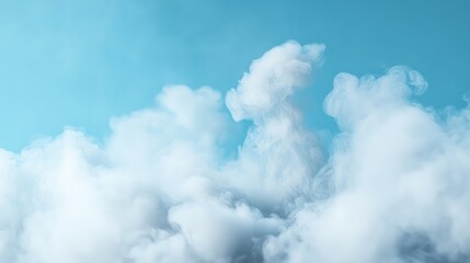 Obraz premium Abstract clouds of white vapor against a pastel blue sky