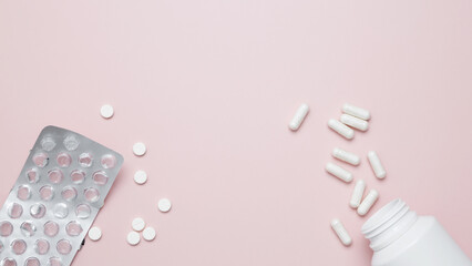 Concept of medicine, healthcare, and pharmaceutical industry. Blister of tablets and bottle...