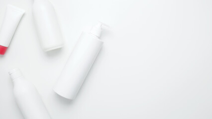 Bottles and tubes with branding mock up.  Cosmetic beauty products. Skin care and beauty concept