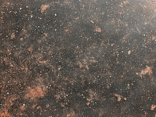 Close-up of a heavily weathered and rusted metal surface