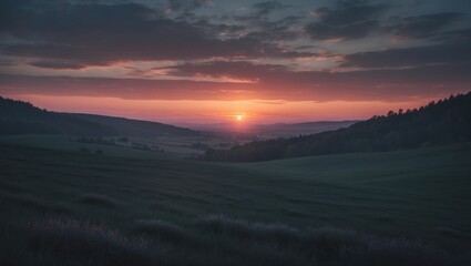 Fototapeta premium Sunset over rolling hills with a dramatic sky and vibrant colors. Nature and landscape scene. Tranquil evening view. Serene and picturesque rural landscape.