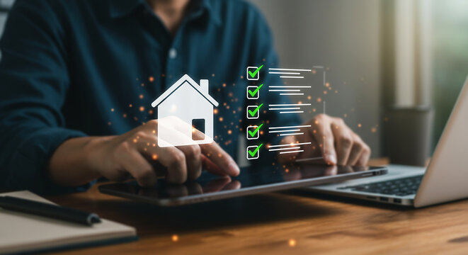 Digital Home Inspection: A person, working from a desk, reviews a digital interface showcasing property checklist, symbolizing real estate processes.