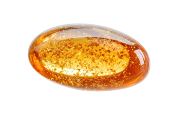 Omega capsule soft gel containing fish oil with a vibrant golden appearance, suitable for health and nutrition purposes observed in a bright setting