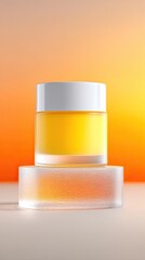 Yellow Eye Cream in Glass Jar on Textured Platform Against Orange Sunset
