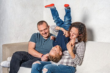 Happy family with pregnant woman expecting another baby.
Concept of maternity, parenting, preparation and expectation for baby.