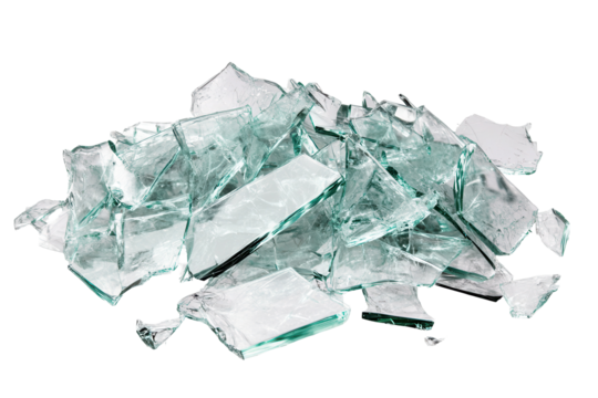 Broken shards of clear glass scattered on a surface, showcasing sharp edges and various shapes under bright illumination