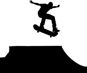 silhouette of a skateboarder jumping