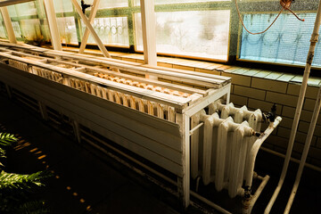 Heating system installation in a bright indoor space during the evening hours