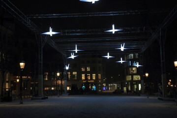 Copenhagen Light Festival, Glowing swans at Højbro Plads in snow, Denmark