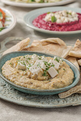 Baba ghanoush mediterranean dip made of eggplant.
Delicious roasted and smashed eggplant along with other ingredients.