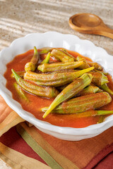 Okra plate with tomato sauce.
Delicious stew made with Bamya vegetables found all over the east Mediterranean cultures.