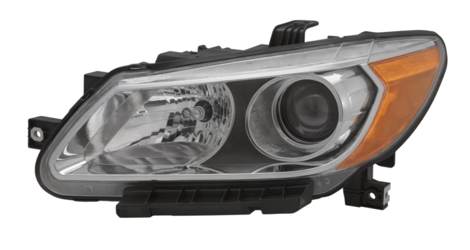 Automotive headlight assembly with clear lens and yellow indicator  isolated on a transparent background