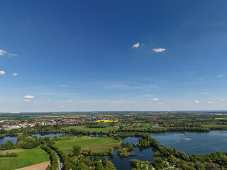 Experience the breathtaking aerial view of lush, green landscapes paired with tranquil water bodies...