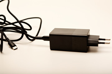 A new charger for gadgets with a wire. USB charging with a wire.