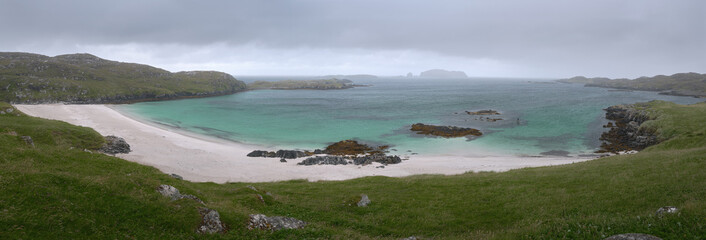 Panorama of a sand beach and the turquoise sea in the north of Scotland. Isle of Lewis, Scotland. Vacation holiday banner