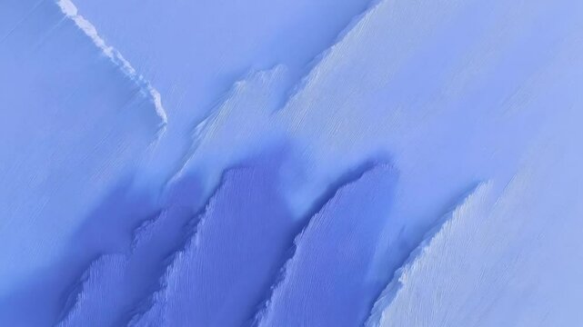 Abstract blue patterns create a tranquil, artistic background reminiscent of icy landscapes and fluid brushstrokes, ideal for creative design projects