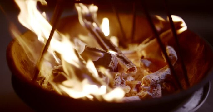 Traditional Fire-Roasted Sweet Potatoes on Open Flame