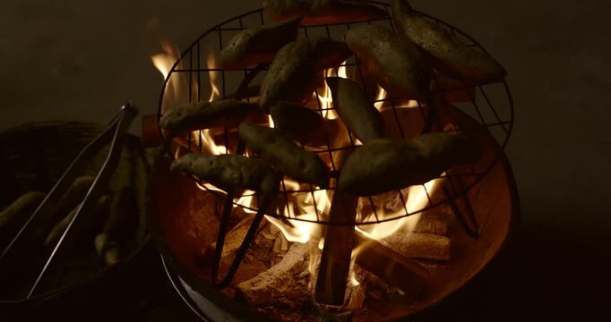 Traditional Fire-Roasted Sweet Potatoes on Open Flame