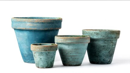 Four rustic blue ceramic planters of various sizes, perfect for home gardening and DIY projects, evoke charm and versatility with a vintage touch
