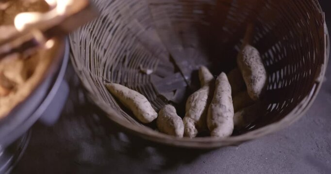 Traditional Fire-Roasted Sweet Potatoes on Open Flame