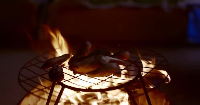 Traditional Fire-Roasted Sweet Potatoes on Open Flame