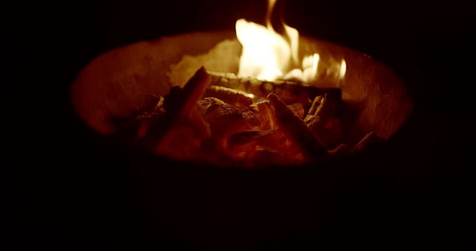 Burning Firewood and Charcoal in a Rural Kiln with Flying Fire Particles