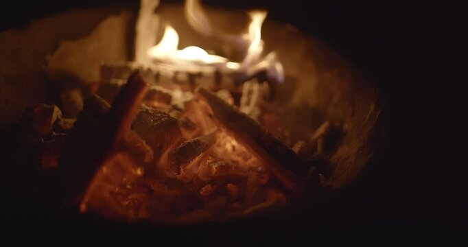 Burning Firewood and Charcoal in a Rural Kiln with Flying Fire Particles