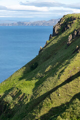 The Isle of Skye,  is a large and scenic island in the Inner Hebrides of Scotland. It's known for its dramatic landscapes. Panoramic view from the viewpoint near Lealt falls.