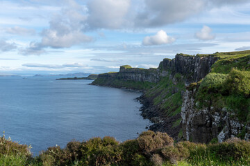 The Isle of Skye,  is a large and scenic island in the Inner Hebrides of Scotland. It's known for its dramatic landscapes. Panoramic view from the viewpoint near Lealt falls.