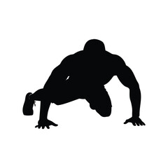Silhouette of a muscular man doing a plank exercise, a fitness concept