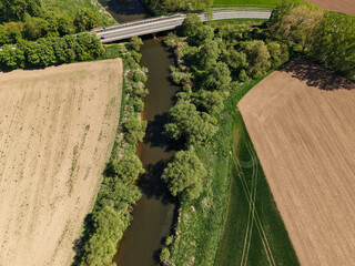 A Stunning Aerial View of a Scenic River Beautifully Surrounded by Farmland Landscape Koldinger...