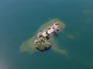 Take in the Aerial View of a Beautifully Serene Island Surrounded by Tranquil Waters Koldinger Seen...