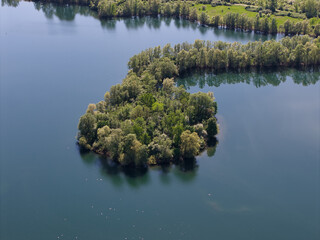 A Beautiful and Serene Aerial View of a Tranquil Island Surrounded by Calm, Peaceful Waters...