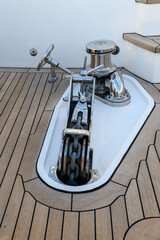Anchor winch and cleat on superyacht. Anchoring and mooring gear on the bow of yacht. Superyacht...