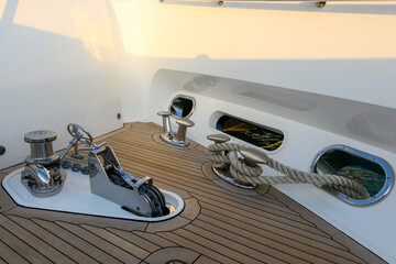 Bollard (cleat) with mooring line on superyacht. Mooring gear on yacht. Superyacht equipment. 