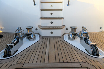 Teak stairs ladder on luxury yacht. Elements of yacht construction. Superyacht concept.