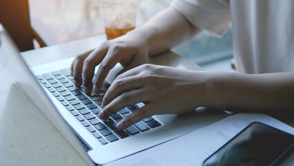 Typing and working on laptops, office workers and working from home, freelancers and freelance...
