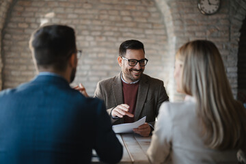 Business people meeting with a banker 