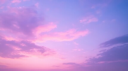 Colorful Sunset Sky with Soft Clouds in Shades of Pink and Purple