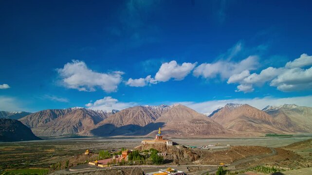 Timelapse A golden statue of Maitreya Buddha at Diskit Monastery also known as Diskit Gompa or Diskit Gompa is the oldest and largest Buddhist monastery in the Nubra Valley of Ladakh, northern India.