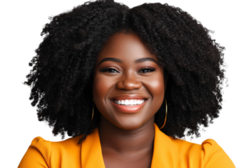 Joyful young woman with natural curly hair smiling brightly in a vibrant orange blazer, exuding confidence and positivity against a neutral background