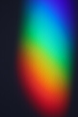 Soft focus rainbow neon grain blur texture wall with prism refraction. Light and shadow smoke...