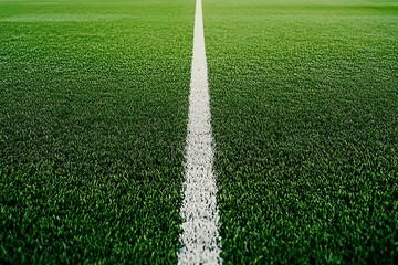 Close up of a bright white line marking on a vibrant green artificial turf sports field © Proshanto49