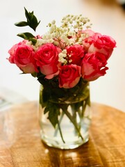 Pink Roses with Baby's Breath in Vase