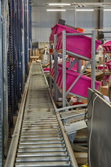 Automated Warehouse with Conveyors and Mixed Inventory