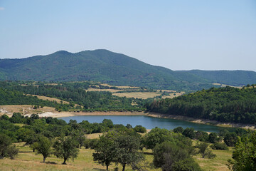 
landscape nature Bulgaria mountains forest greenery pond blue sky view from above