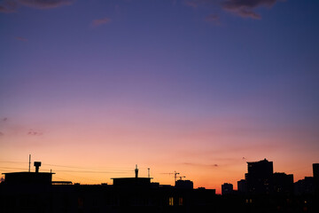 Kyiv Skyline at Colorful Sunset with Construction Cranes