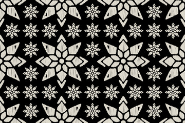 Geometric Indonesian batik ikat motifs African boho floral pattern.Seamless vintage background.baroque pattern.Ikat ethnic flower oriental pattern traditional.Aztec traditional textile.