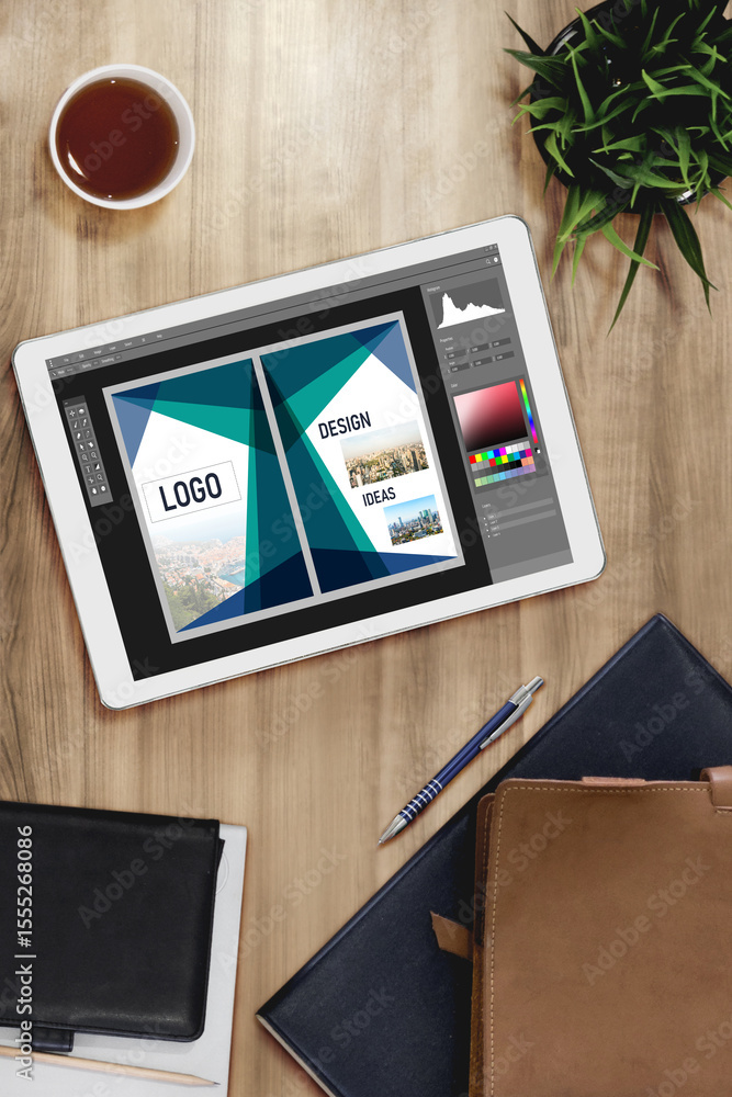 Poster graphic designer software for modern design of web page and commercial ads showing on the computer s